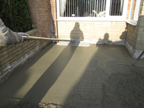 Concrete being levelled during installation